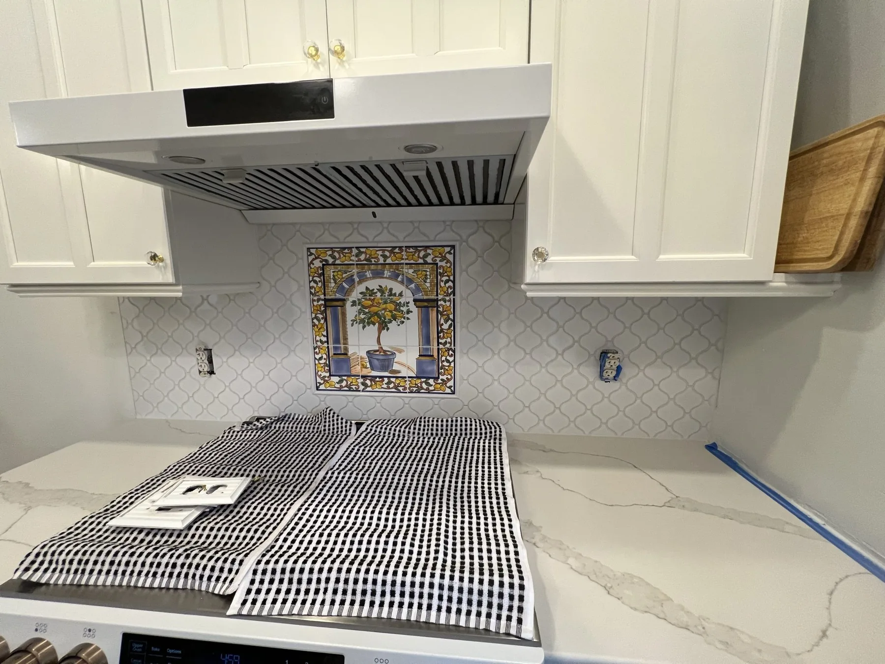 Remodeled kitchen with natural wood cabinetry by Wahr Home Solutions